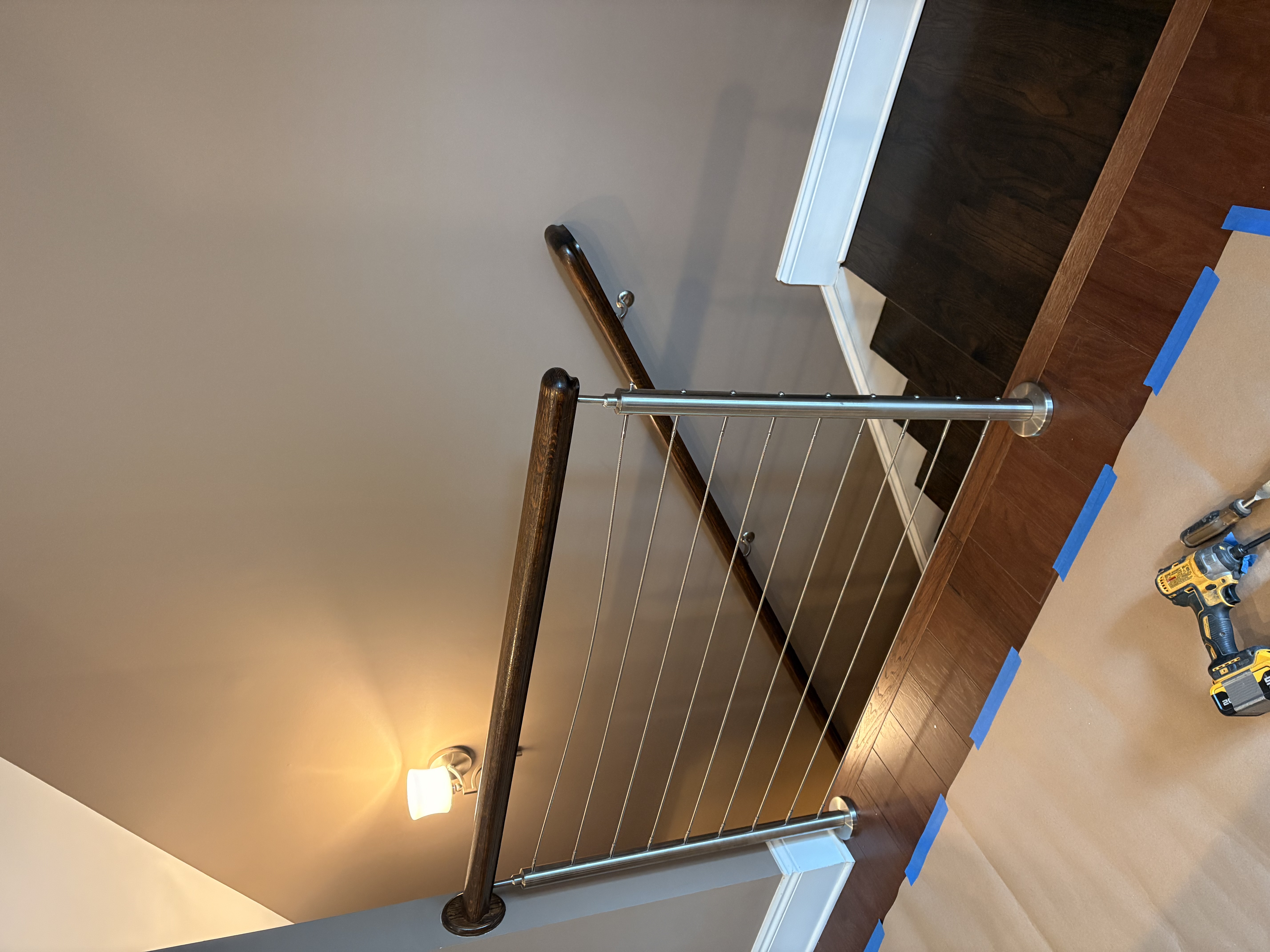 Stainless steel posts with wood handrail